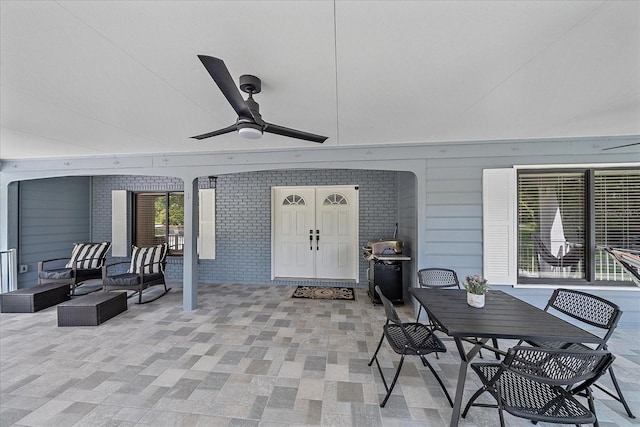 view of terrace featuring an outdoor hangout area and ceiling fan