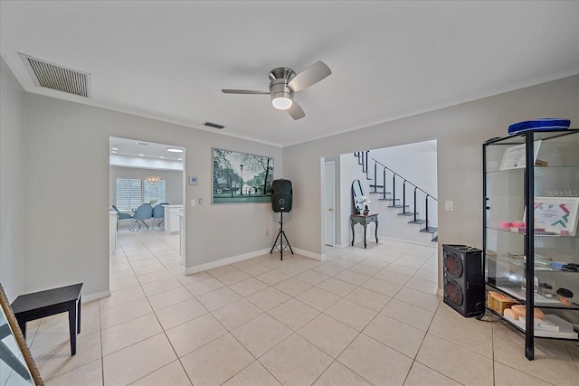 interior space featuring ceiling fan and light tile floors