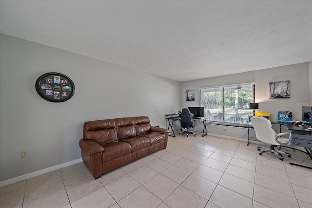 office with light tile floors and a textured ceiling