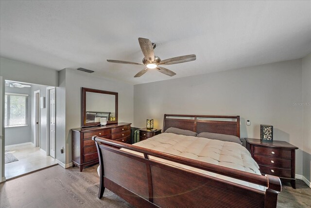 bedroom featuring ceiling fan and light wood-type flooring