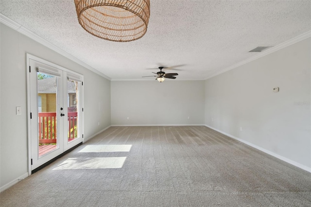 empty room with light carpet, ceiling fan, a wealth of natural light, and ornamental molding