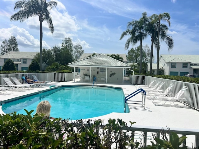 view of swimming pool featuring a patio