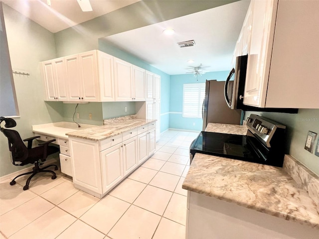 kitchen featuring light tile flooring, white cabinetry, kitchen peninsula, stainless steel appliances, and ceiling fan