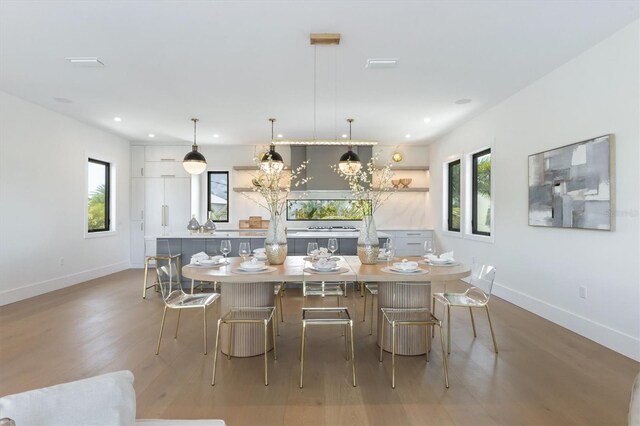 dining room featuring light hardwood / wood-style flooring