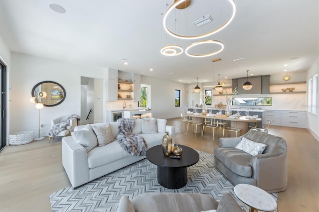 living room with light hardwood / wood-style floors