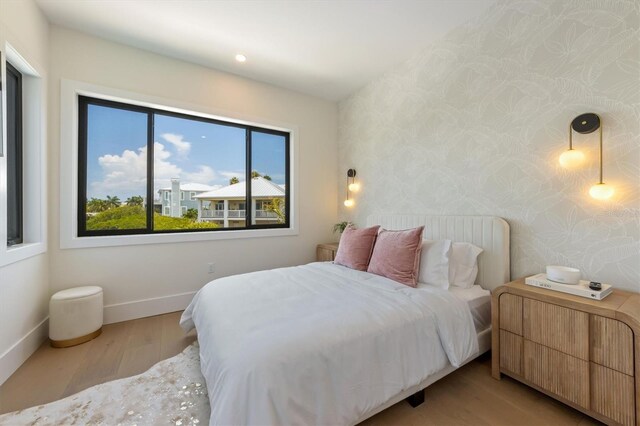 bedroom with light hardwood / wood-style floors