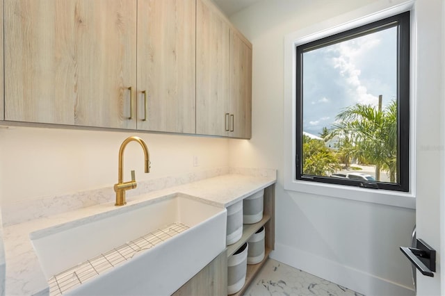 interior space with a wealth of natural light and sink