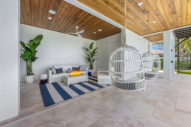 view of patio featuring ceiling fan and an outdoor living space