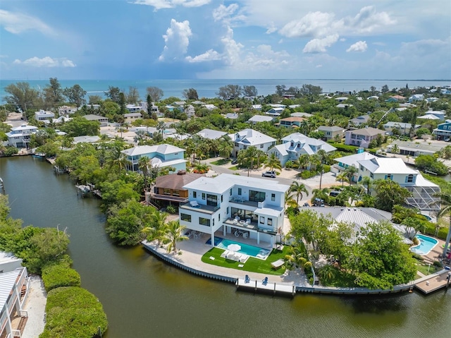 bird's eye view with a water view