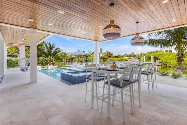 view of patio / terrace with a water view