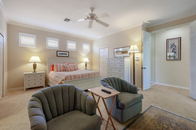 tiled bedroom with ornamental molding, a closet, and ceiling fan