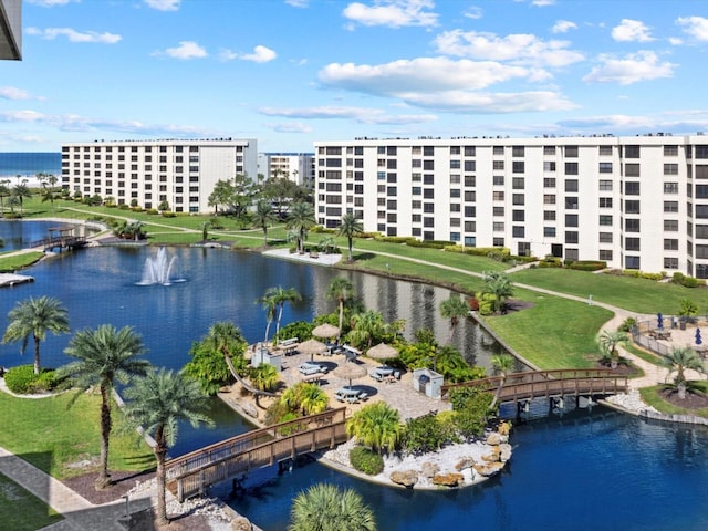 birds eye view of property featuring a water view