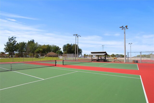 view of sport court with a gazebo