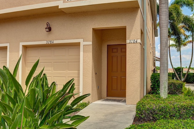 property entrance featuring a garage