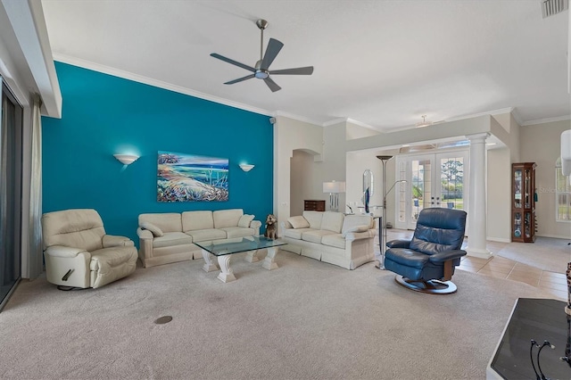 carpeted living room featuring french doors, ceiling fan, and crown molding