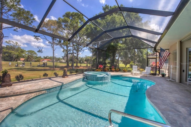 view of swimming pool featuring a patio area, a lanai, and an in ground hot tub