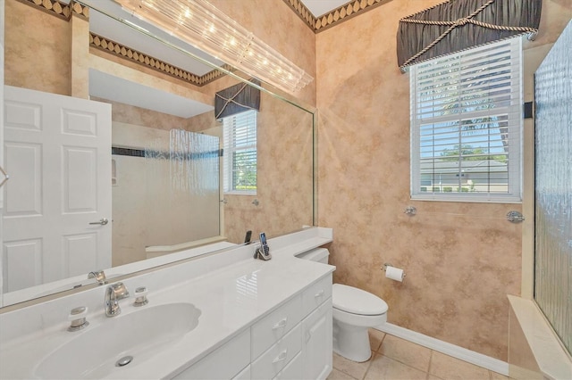 bathroom featuring tile patterned flooring, vanity, and toilet