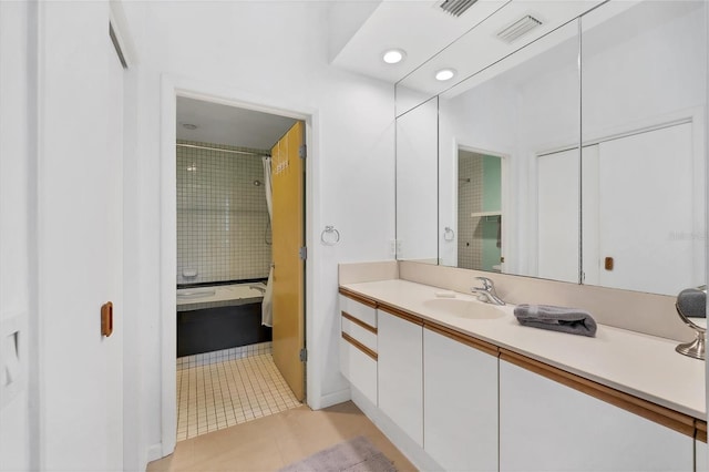 bathroom with vanity and tile patterned floors