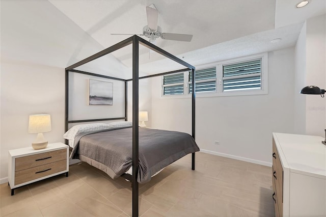 bedroom featuring ceiling fan and vaulted ceiling