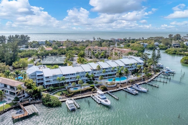 birds eye view of property featuring a water view