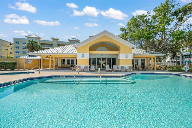 view of swimming pool featuring a patio