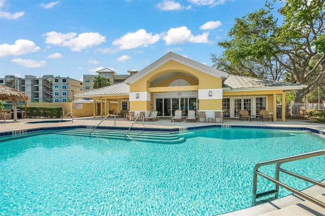 view of swimming pool with a patio area