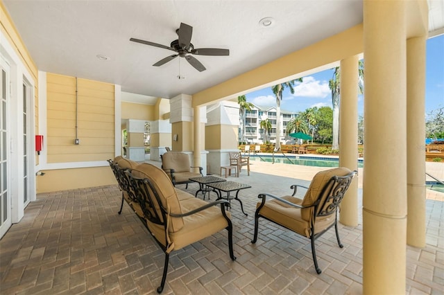 view of patio / terrace featuring ceiling fan