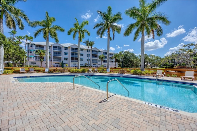 community pool with a patio