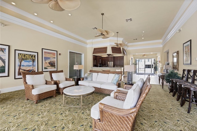 living room with recessed lighting, visible vents, baseboards, a ceiling fan, and ornamental molding