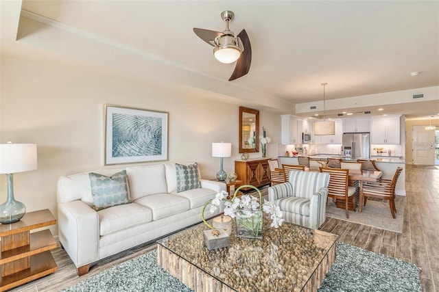 living room with ceiling fan