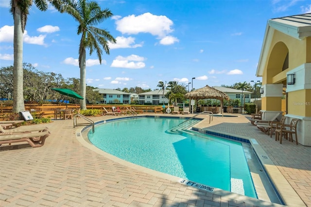 view of pool featuring a gazebo and a patio area