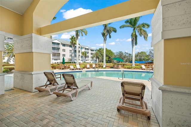 view of pool with a patio