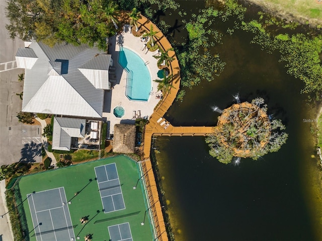 birds eye view of property featuring a water view