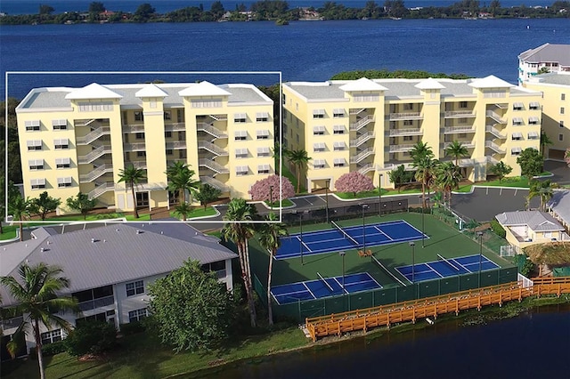 birds eye view of property featuring a water view