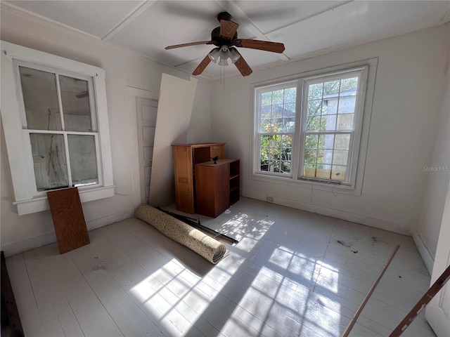 unfurnished room featuring ceiling fan