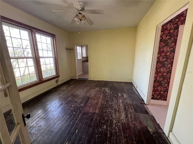 unfurnished room featuring ceiling fan and wood-type flooring