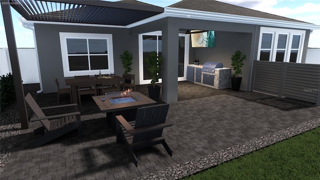 view of patio with a fire pit, exterior kitchen, and area for grilling