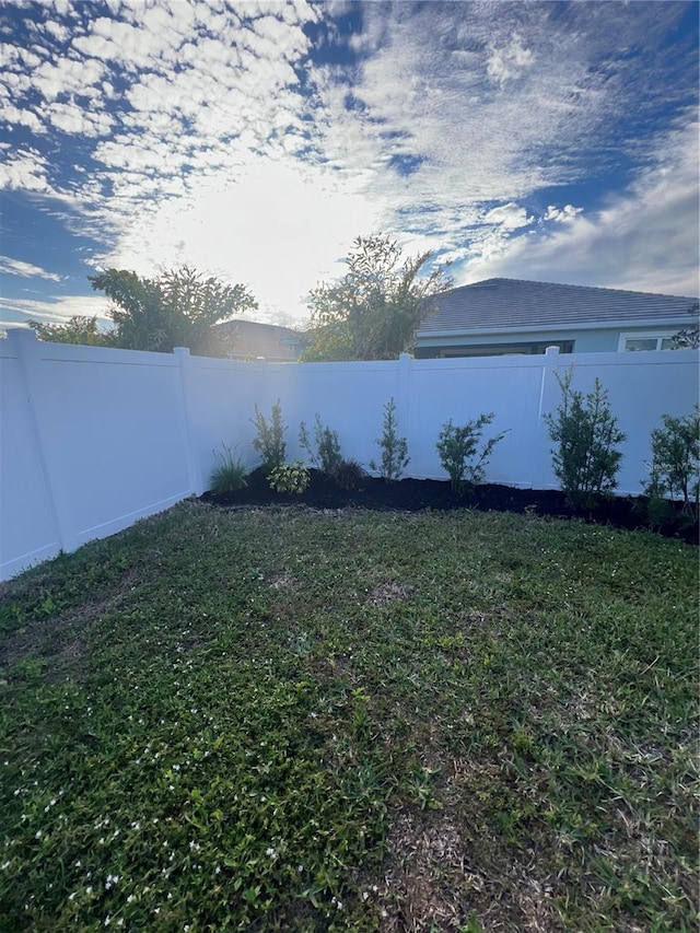 view of yard featuring a fenced backyard