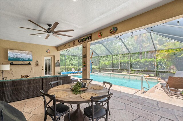 view of swimming pool featuring ceiling fan