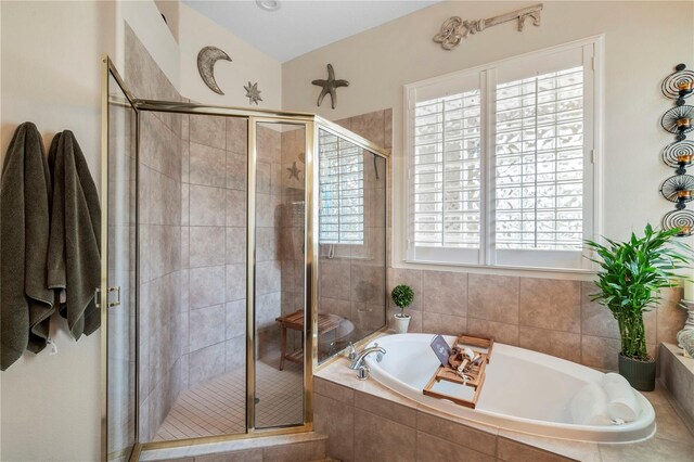 bathroom with independent shower and bath