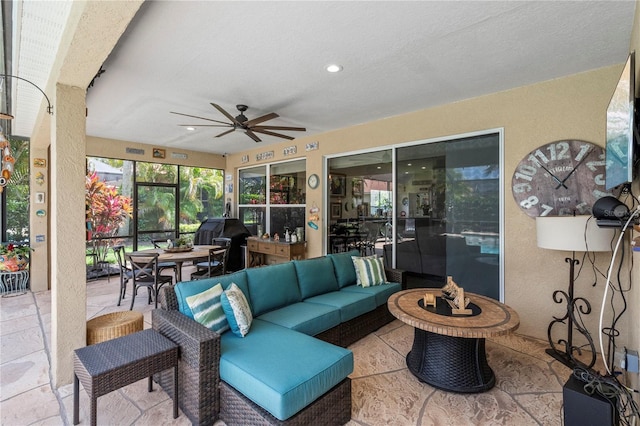 view of patio / terrace featuring a grill, an outdoor hangout area, and ceiling fan