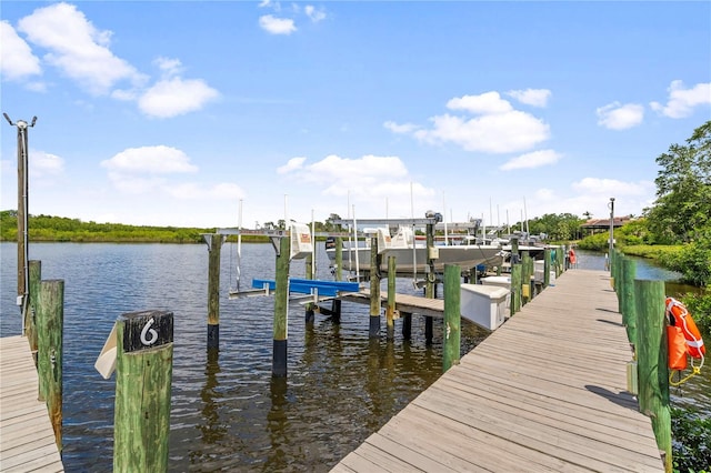 view of dock with a water view