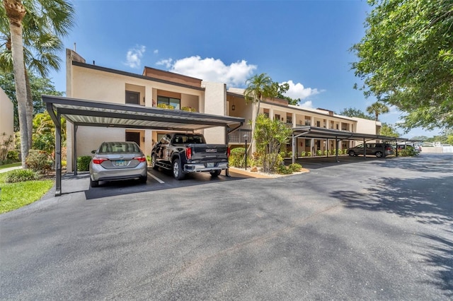 view of front of property with a carport