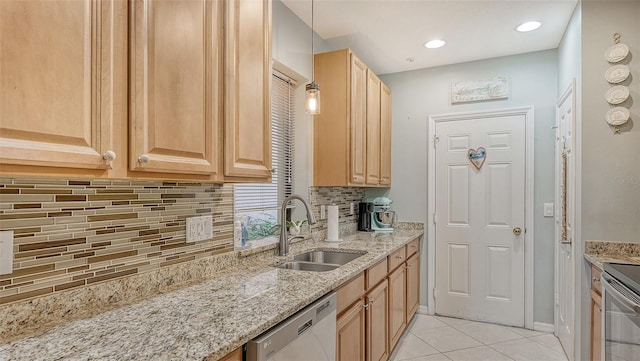 kitchen with light stone countertops, dishwashing machine, backsplash, light tile flooring, and sink