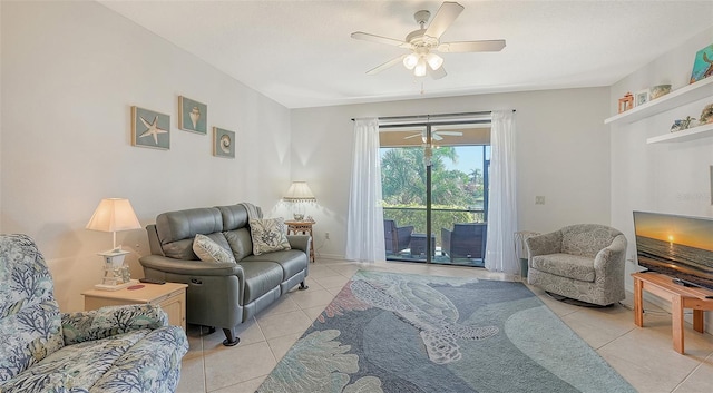 living room featuring ceiling fan and light tile floors