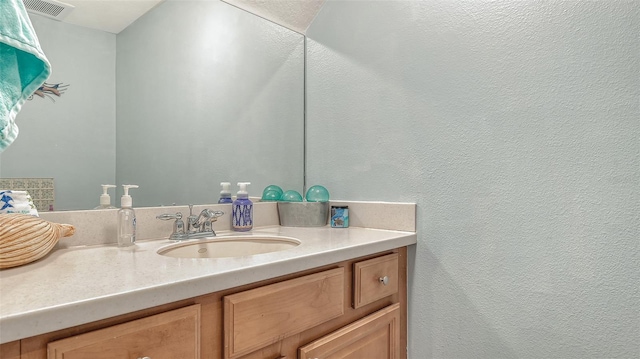 bathroom with large vanity