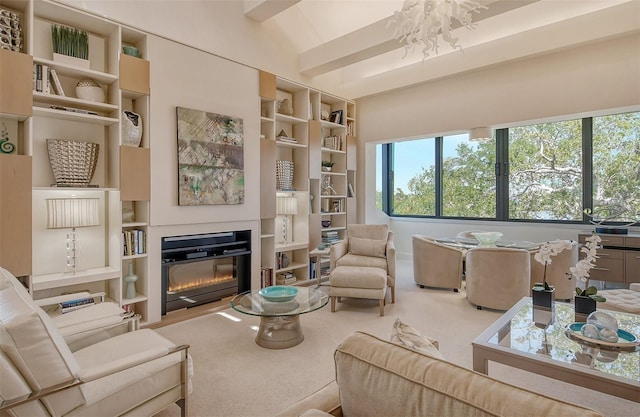 living room featuring lofted ceiling with beams