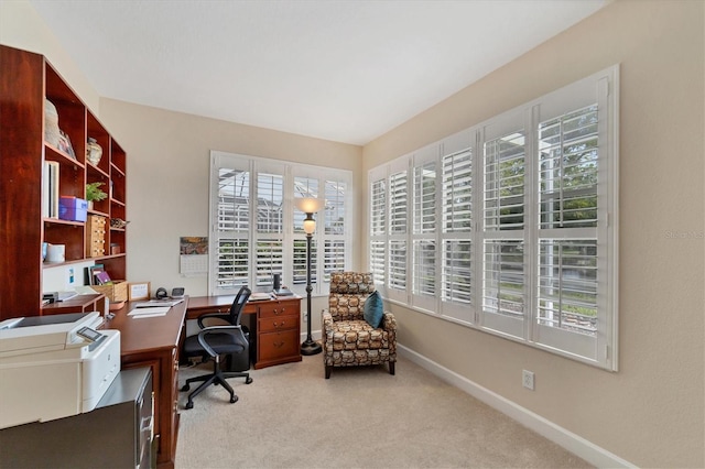 view of carpeted office space