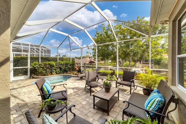 view of patio / terrace with a lanai