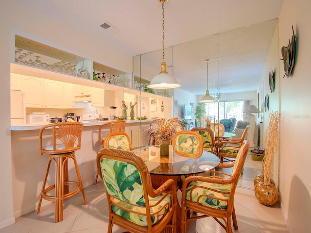 view of tiled dining area